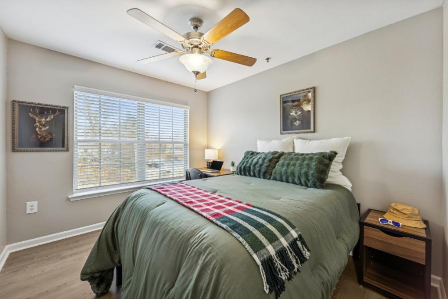 A furnished bedroom at The Harbor