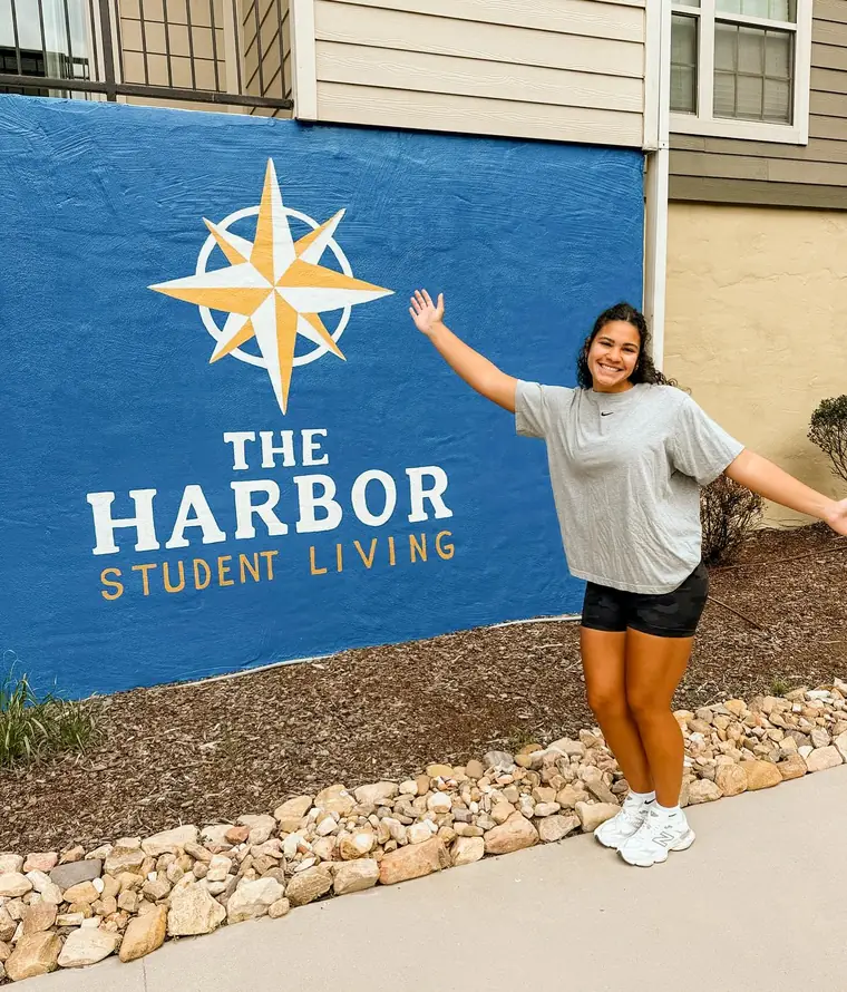 A resident at the Harbor sign
